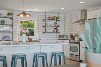 Welcome to this beautifully renovated lakefront retreat offering - photo 7