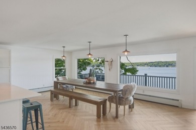 Welcome to this beautifully renovated lakefront retreat offering - photo 9