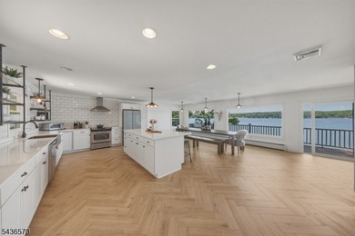 Welcome to this beautifully renovated lakefront retreat offering - photo 10