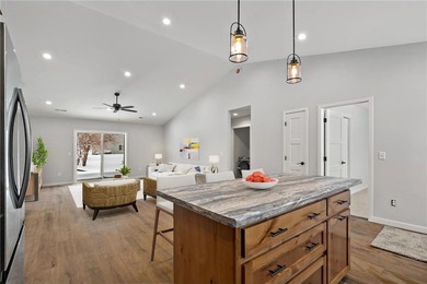 Discover easy living in this thoughtfully designed open-concept