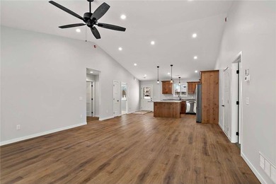 Discover easy living in this thoughtfully designed open-concept