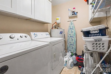Tucked away on a quiet, tree-lined cul-de-sac, this charming - photo 15