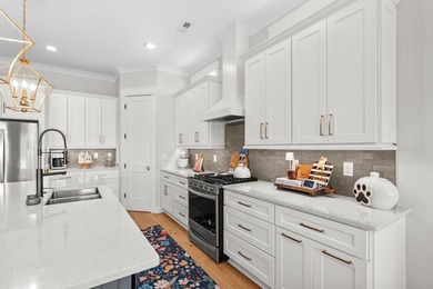 Look No Further! Tucked along the lakefront in the gated - photo 16