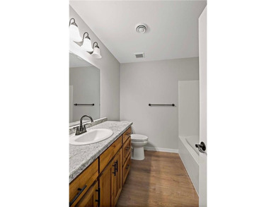 Discover easy living in this thoughtfully designed open-concept