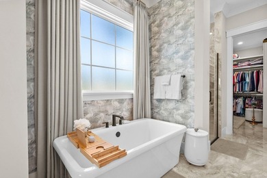 Look No Further! Tucked along the lakefront in the gated - photo 25