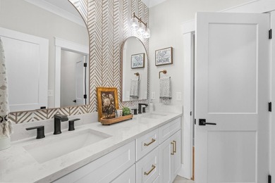 Look No Further! Tucked along the lakefront in the gated - photo 38