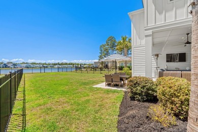 Look No Further! Tucked along the lakefront in the gated - photo 52