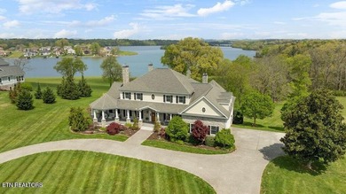 Experience luxury lakefront living in the prestigious gated - photo 2