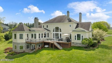 Experience luxury lakefront living in the prestigious gated - photo 4