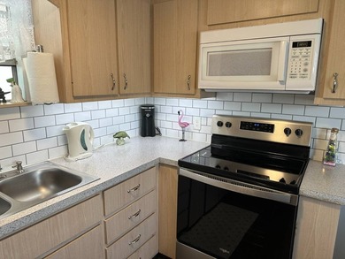 Beautifully Upgraded Home in a 55+ Community Welcome to this - photo 5