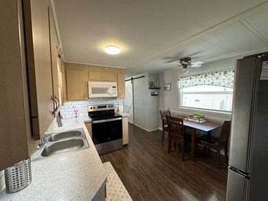 Beautifully Upgraded Home in a 55+ Community Welcome to this - photo 8