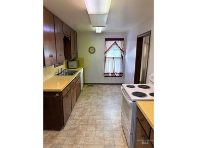 Charming historic home in downtown Fruitland. Located next door