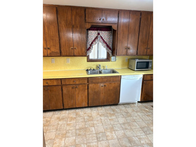 Charming historic home in downtown Fruitland. Located next door