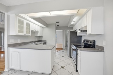 ***Seller will provide a roof replacement prior to closing with - photo 8