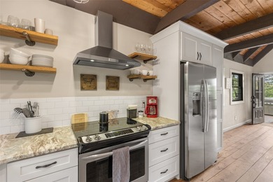 Experience elevated mountain living in this beautifully restored - photo 26