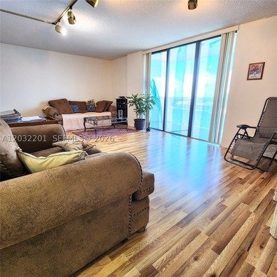 Floor to ceiling windows offer stunning lake, skyline, & sunset - photo 4