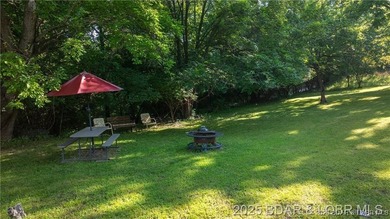Own a piece of historic Old Linn Creek with this beautiful and - photo 27