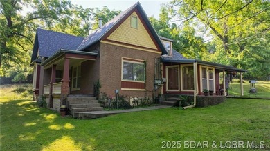 Own a piece of historic Old Linn Creek with this beautiful and - photo 28