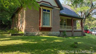Own a piece of historic Old Linn Creek with this beautiful and - photo 30