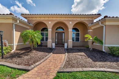 Set behind the gates of Lake Toscana, this exceptional lakefront - photo 3