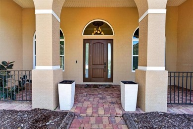 Set behind the gates of Lake Toscana, this exceptional lakefront - photo 4