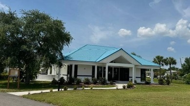 Enjoy waterfront living in this 2-bedroom, 1.5-bath home located - photo 45