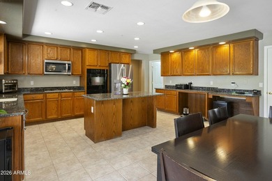This five-bedroom, four bath home located in the sought-after - photo 13