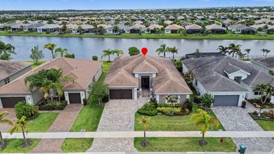 Experience elevated lakefront living in this exquisitely - photo 2