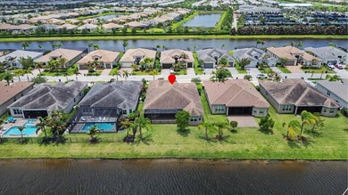 Experience elevated lakefront living in this exquisitely - photo 3