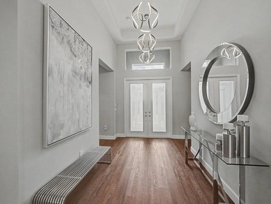 Experience elevated lakefront living in this exquisitely - photo 8