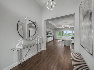 Experience elevated lakefront living in this exquisitely - photo 9