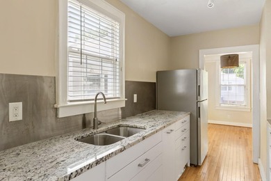Full of charm, natural light, and future potential, this updated - photo 11