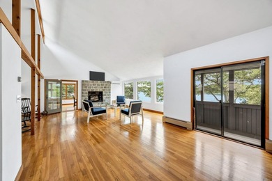 Set on over 3 private acres along the protected shores of - photo 14