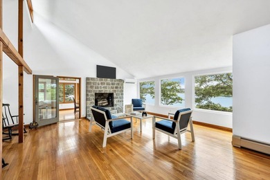 Set on over 3 private acres along the protected shores of - photo 15