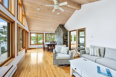 Set on over 3 private acres along the protected shores of - photo 21