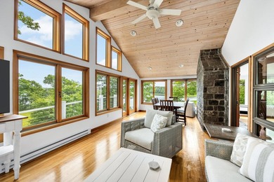 Set on over 3 private acres along the protected shores of - photo 22