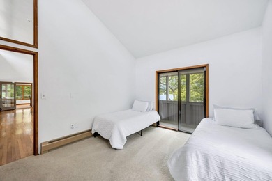 Set on over 3 private acres along the protected shores of - photo 30