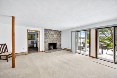 Set on over 3 private acres along the protected shores of - photo 33
