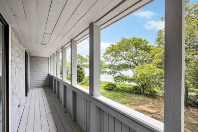 Set on over 3 private acres along the protected shores of - photo 40