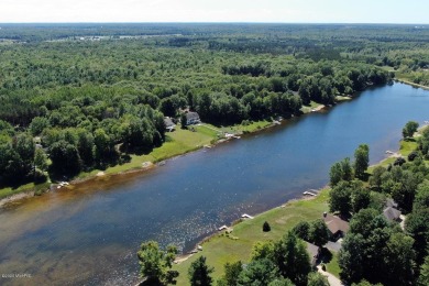 Superb lakefront lot on Fawn Lake with southern exposure. Live - Lake Lot For Sale in Canadian Lakes, Michigan