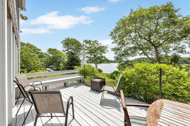 Set on over 3 private acres along the protected shores of - photo 42