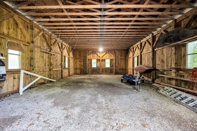 Set on over 3 private acres along the protected shores of - photo 46