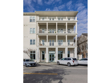 Welcome to this sun-filled two bedroom, two-and-a-half bath