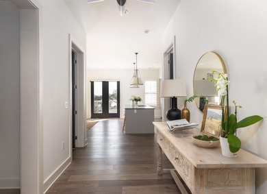 Welcome to this sun-filled two bedroom, two-and-a-half bath