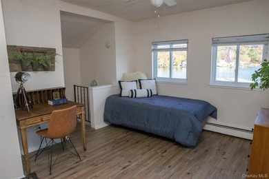 Live the lake life and generate rental income! This rare - photo 18