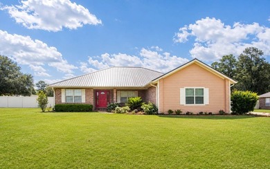 Welcome home to this beautiful, move-in-ready brick home located - photo 1