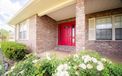 Welcome home to this beautiful, move-in-ready brick home located - photo 2