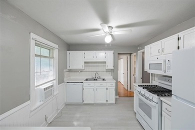 Darling 2 bedroom 1 bath updated house sits on a secluded treed - photo 8
