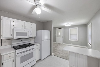 Darling 2 bedroom 1 bath updated house sits on a secluded treed - photo 9
