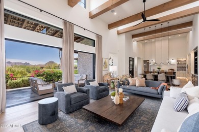 First time offered, this 2023 custom estate in the gated - photo 1